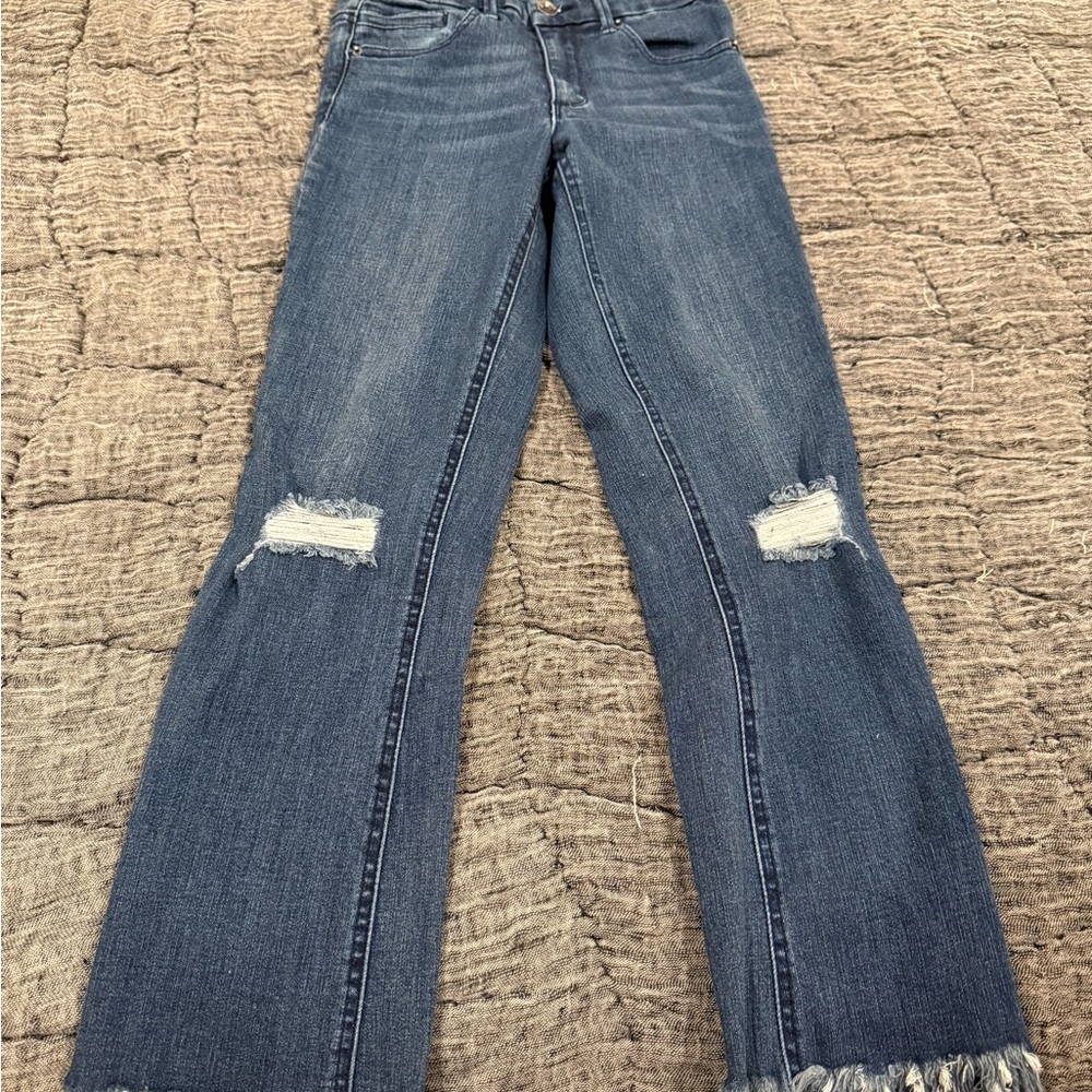 Women's Distressed Blue Jeans